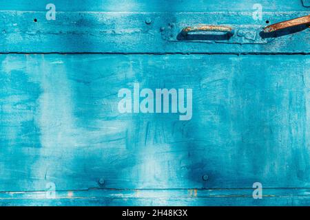 Aged Natural Old Blue Color Obsolete Metallic Background. Grungy Vintage Metal Surface. Painted Obsolete Weathered Texture Of Door Stock Photo