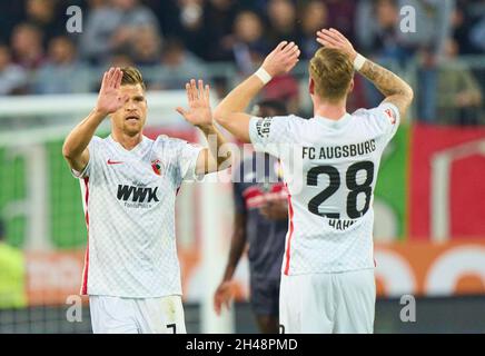 Augsburg, Germany. 31st Oct, 2021. Florian NIEDERLECHNER, FCA 7 celebrates his goal, happy, laugh, celebration, 3-1 with Andre HAHN, FCA 28 in the match FC AUGSBURG - VFB STUTTGART 4-1 1.German Football League on October 31, 2021 in Augsburg, Germany. Season 2021/2022, matchday 10, 1.Bundesliga, 10.Spieltag. Credit: Peter Schatz/Alamy Live News Stock Photo