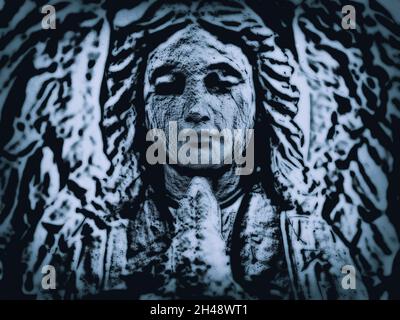 Gravestone Angel praying with pop art filters Stock Photo
