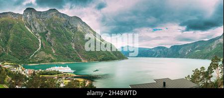 Panorama Of Eidfjord, Norway. Stockholm, Sweden. Touristic Ship Or Ferry Boat Boat Liner Moored Near Harbour In Summer Day. Aerial Panoramic View Of Stock Photo