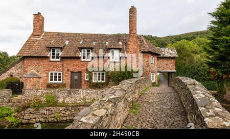 Cottage and Bridge at Allerford, Somerset, UK Stock Photo