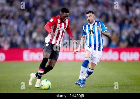 Diego Rico of Real Sociedad and Inaki Williams of Athletic Club during the Spanish championship La Liga football match between Real Sociedad and Athletic Club on October 31, 2021 at Reale Arena in San Sebastian, Spain - Photo: Ricardo Larreina/DPPI/LiveMedia Stock Photo