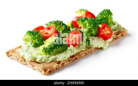 Healthy rye crispbread with broccoli isolated on white background Stock Photo