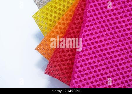 Bright Color palette of special textile mesh. Polyester mesh with foam rubber for the manufacture of backpacks. Lining mesh with foam for the inside o Stock Photo