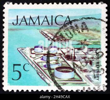JAMAICA - CIRCA 1972: a stamp printed in Jamaica shows Oil refinery, technology, circa 1994 Stock Photo