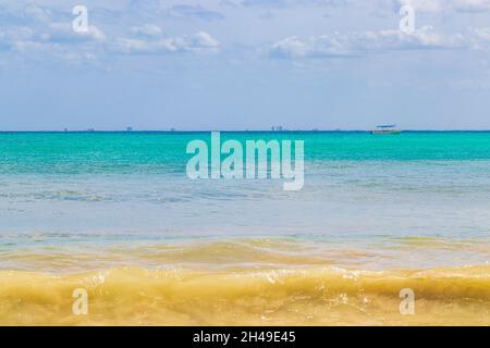 Boats and yachts between Cozumel island and the tropical mexican beach panorama view from Playa 88 and Punta Esmeralda in Playa del Carmen Mexico. Stock Photo