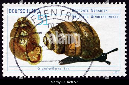 GERMANY - CIRCA 2002: a stamp printed in Germany shows Desmoulins whorl snail (vertigo moulinsiana), endangered species, circa 2002 Stock Photo