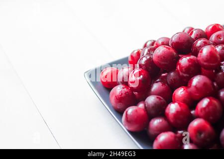 fresh cherry fruits on plate Stock Photo