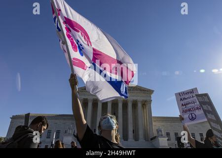 Washington, United States. 01st Nov, 2021. Anti-abortion demonstrators rally outside the U.S. Supreme Court in Washington, DC on Monday, November 1, 2021. On Monday, the Supreme Court is hearing arguments in a challenge to the controversial Texas abortion law, the Biden administration trying to block a law in the courts. Photo by Tasos Katopodis/UPI Credit: UPI/Alamy Live News