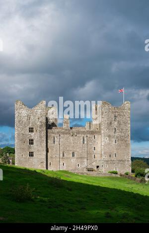 Bolton Castle Yorkshire, view in dramatic weather of Bolton Castle, a historic medieval fortress sited in the centre of the Yorkshire Dales, England Stock Photo