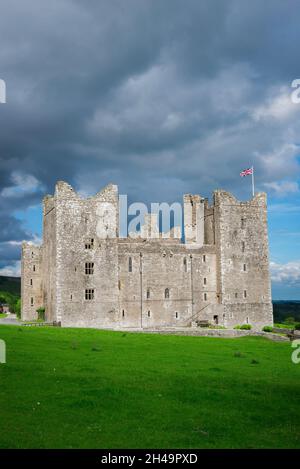 Bolton Castle Yorkshire, view in dramatic weather of Bolton Castle, a historic medieval fortress sited in the centre of the Yorkshire Dales, England Stock Photo