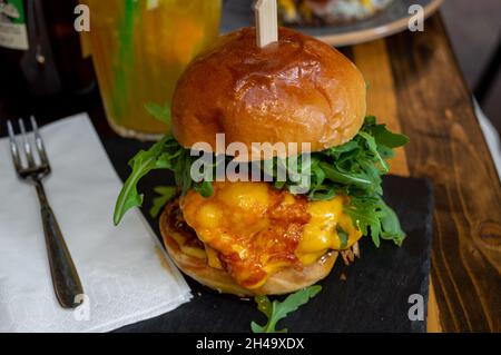 Pulled pork burger with lot of cheese Stock Photo
