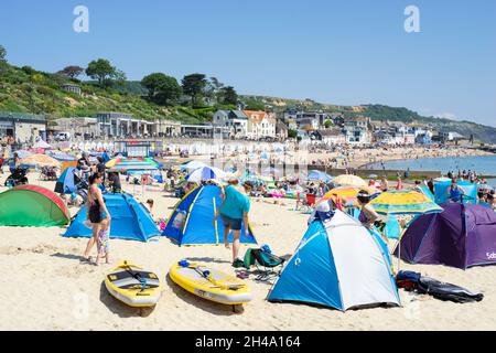 Lyme Regis Family on the beach with pop up beach tents on Sandy beach at Lyme Regis Dorset England UK GB Europe Stock Photo Alamy