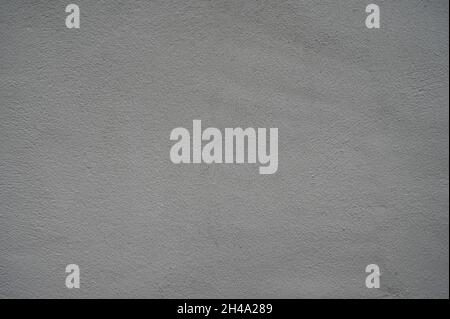 Textured painted outside off white wall background. Stock Photo
