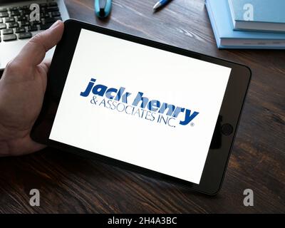KYIV, UKRAINE - October 20, 2021. Jack Henry and Associates logo on the tablet. Stock Photo