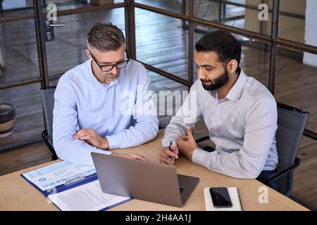 Diverse businessmen executive ceo working together at boardroom meeting. Stock Photo