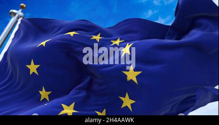 The flag of The European Union flapping in the wind. Economic and finance Community. Politics and Economy. Transnational political government Stock Photo