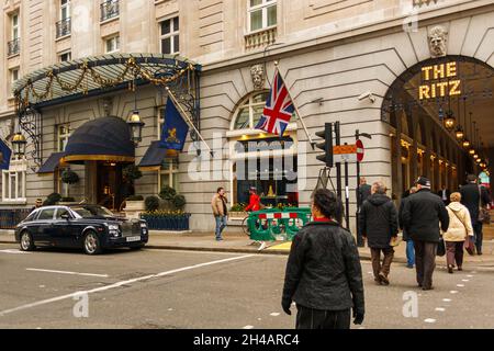 London, United Kingdom; March 15th 2011: Rolls Royce parked at the entrance to the Ritz Hotel in London. Stock Photo