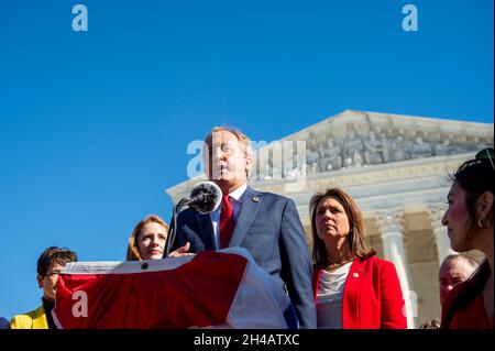 Ken Paxton, Texas attorney general, offers remarks outside in front of the Supreme Court of the United States in Washington, DC, Monday, November 1, 2021. The Supreme Court of the United States agreed to review a controversial Texas abortion law but refused to block the law while it examines the state's unusual enforcement scheme and whether the Department of Justice has the right to sue to block the law. Credit: Rod Lamkey/CNP /MediaPunch Stock Photo