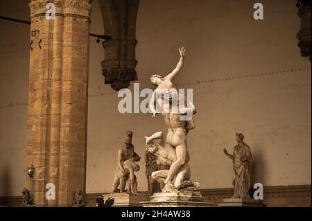 Sculpture of Loggia dei Lanzi and Florence Palazzo Vecchio on Piazza della Signoria in Florence, Italy. Architecture and landmark of Florence Stock Photo