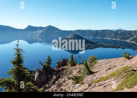 Magnificent reflection of the caldera of Crater Lake in the Crater Lake NP, USA Stock Photo