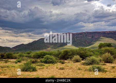 Farm Ozondjisse: Rain clouds over Mount Otjikoko, rainy season,  Omaruru District, Erongo Region, Namibia Stock Photo