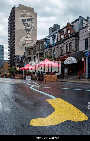 Leonard Cohen commemorative mural 'Tower of Songs' painted by artists Gene Pendon and El Mac on Crescent Street, Montreal, province of Quebec, Canada Stock Photo