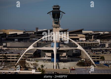 Los Angeles, California, USA. 28th Mar, 2019. The historic Theme Building stands below the Air Traffic Control Tower (ATC) of Los Angeles International Airport (LAX) on Thursday, March 28, 2019 in Los Angeles, Calif. © 2019 Patrick T. Fallon (Credit Image: © Patrick Fallon/ZUMA Press Wire) Stock Photo