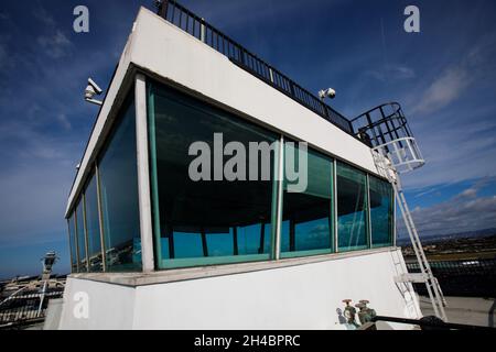 Los Angeles, California, USA. 28th Mar, 2019. The former air traffic control tower atop the Clifton A. Moore Administration Building at Los Angeles International Airport (LAX) overlooking the central terminal area (CTA) including the new ATC tower and Theme Building on Thursday, March 28, 2019 in Los Angeles, Calif. © 2019 Patrick T. Fallon (Credit Image: © Patrick Fallon/ZUMA Press Wire) Stock Photo