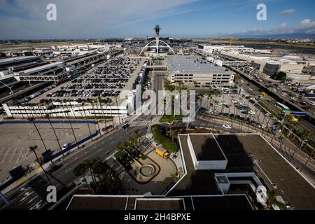 Los Angeles, California, USA. 28th Mar, 2019. The Los Angeles International Airport (LAX) central terminal area (CTA), Theme Building, and Air Traffic Control Tower (ATC) as seen from the roof of the Clifton A. Moore Administration Building, the former air traffic control tower, on Thursday, March 28, 2019 in Los Angeles, Calif. © 2019 Patrick T. Fallon (Credit Image: © Patrick Fallon/ZUMA Press Wire) Stock Photo