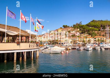 Porto Azzurro, Island of Elba, Italy - 19 September 2021 Colorful cityscape of Harbor of Porto Azzurro Stock Photo