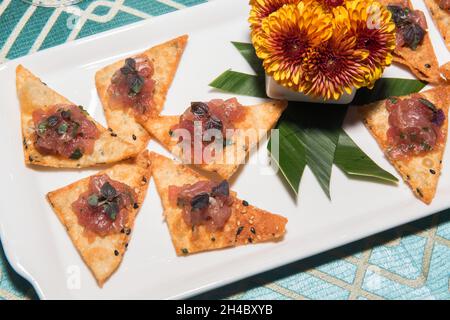 An hors d'oeuvre, appetizers are being passed at an event. Stock Photo