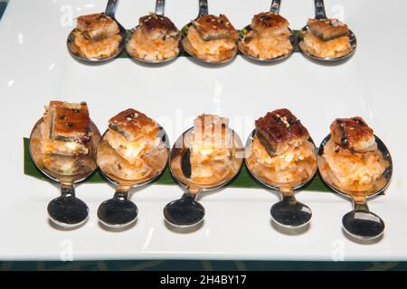 An hors d'oeuvre, appetizers are being passed at an event. Stock Photo