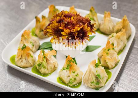 An hors d'oeuvre, appetizers are being passed at an event. Stock Photo