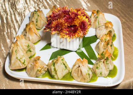 An hors d'oeuvre, appetizers are being passed at an event. Stock Photo