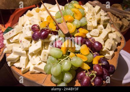 A cheese buffet is set up at an event. Stock Photo