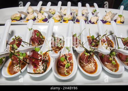 An hors d'oeuvre, appetizers are being passed at an event. Stock Photo