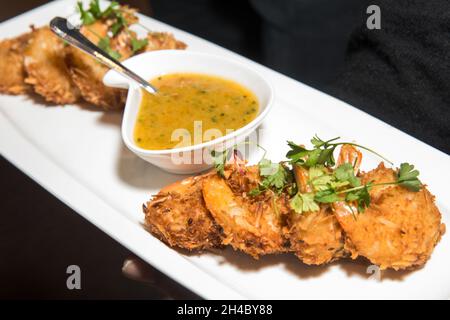 An hors d'oeuvre, appetizers are being passed at an event. Stock Photo