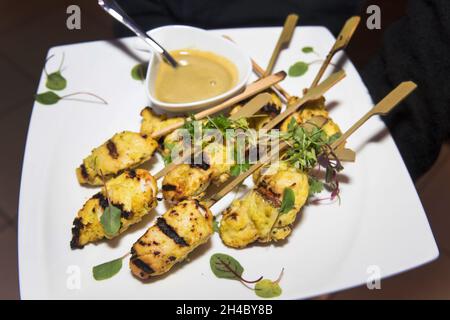 An hors d'oeuvre, appetizers are being passed at an event. Stock Photo