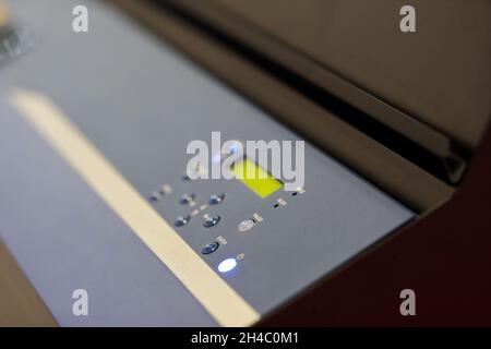 Control panel of inkjet wide format printer. Selective focus. Stock Photo