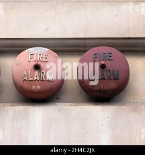 Old vintage fire alarm bells on a building Stock Photo