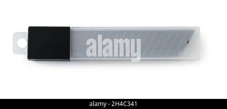 stationery knife blades on white isolated background Stock Photo