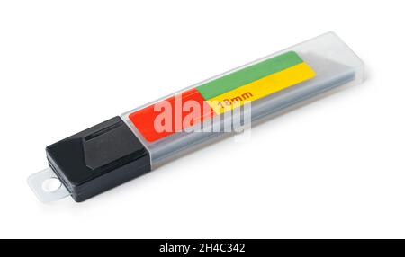 stationery knife blades on white isolated background Stock Photo