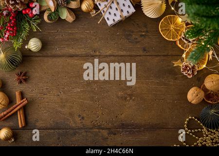 Festive christmas decor on wooden background. Copy space, horizontal top view Stock Photo