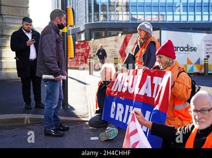 Protesters from Insulate Britain blocking Great Charles Queensway in Birmingham. Picture date: Tuesday November 2, 2021. Stock Photo