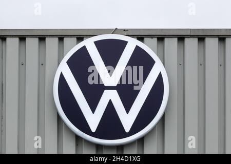 Horsens, Denmark - May 13, 2021: Volkswagen logo on a facade. Volkswagen is a German car manufacturer headquartered in Wolfsburg, Germany Stock Photo