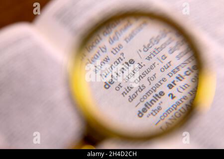 Longman Dictionary open page showing the definition of the word DEFINITE and other words Stock Photo