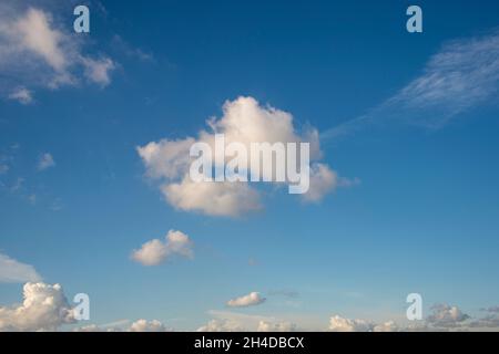 Single white cloud in a blue sky Stock Photo