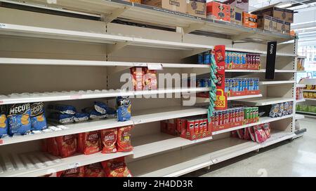 London, UK, 2 November 2021: In the Balham branch of Sainsbury's there are empty shelves where normally there would be multipacks of Walker's Crisps. An IT upgrade at the company's factory in Leicester has led to production problems which are now affecting supplies in shops. Anna Watson/Alamy Live News Stock Photo