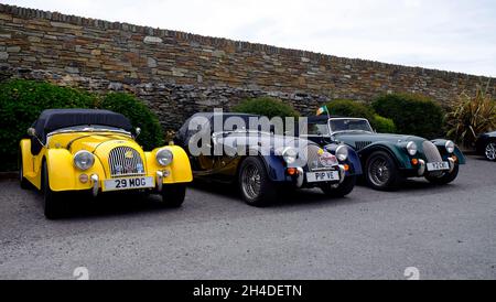 3 Morgan Plus Four sports cars lined up in West Cork Ireland Stock Photo